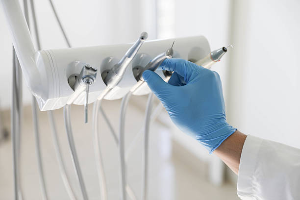 Professional Dental Implants technician working in Village of the Branch, NY